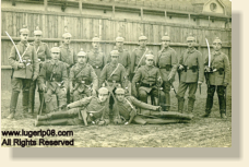 Artillery crew armed with Artillery Luger and Mauser C96. All Rights Reserved.
